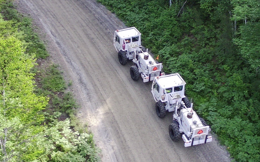 Figure 2 — Natural Resources Canada seismic survey: vibroseis units work as a pair, sending a signal into the ground that is recorded by ground sensors.